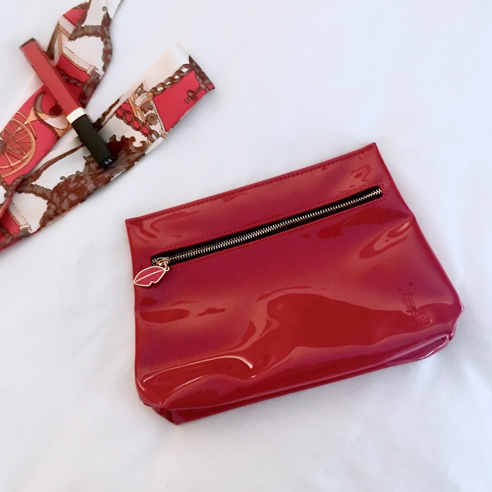 {ysl} red patent asymmetrical zip cosmetic bag